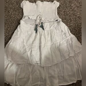 White Tiered Smocked Girls' Dress with Tassel Detail